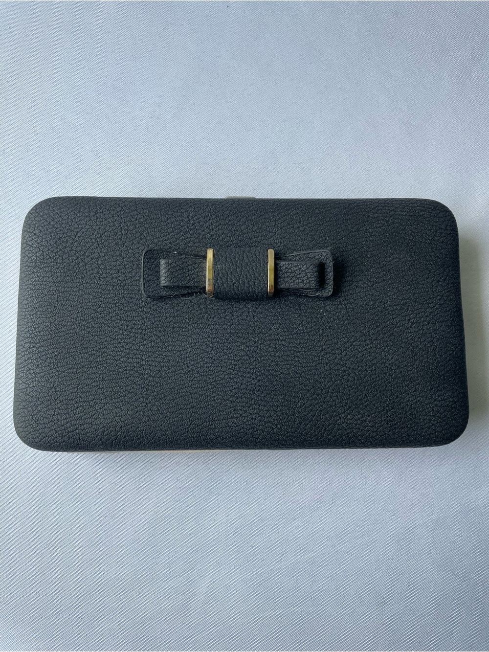Elegant Black Clutch with Bow Accent